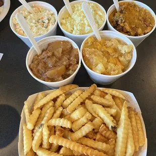 Coleslaw, potato salad, Brunswick stew, apple cobbler, and peach cobbler, and fries