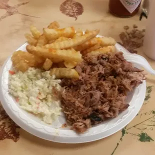 Pulled  BBQ pork plate,  fries  and slaw.  Perfect low  cal fat free  lunch.  Awesome  as always.