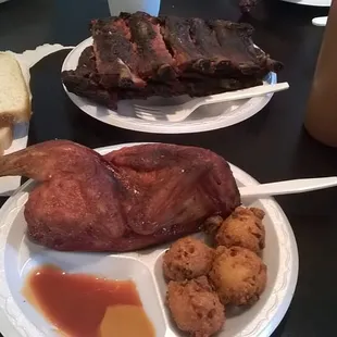 a plate of meat and sides