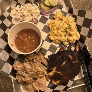 Pulled pork, brisket, baked beans, mac and cheese, cole slaw