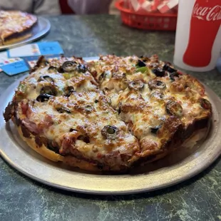 Deep dish supreme...reminded me of old school personal pans!!  So good!!