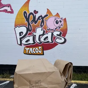 My to-go order outside near their mural
