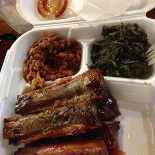 This was the 1/2 wet ribs platter with (BBQ?) beans, greens and we ordered two muffins on the side