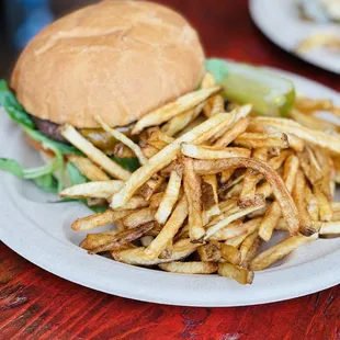 Grass-fed beef cheese burger. Cooked perfectly. It was juicy and delicious. And the fries are amazing. Definitely getting this again.