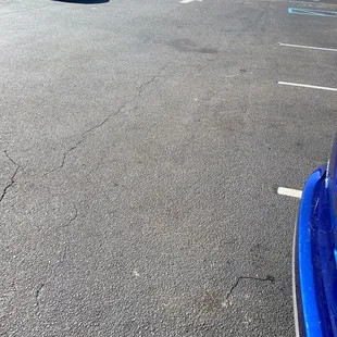 Parking lot has been resurfaced. Not new but not bad