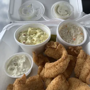 Catfish bites dinner with potato salad and slaw