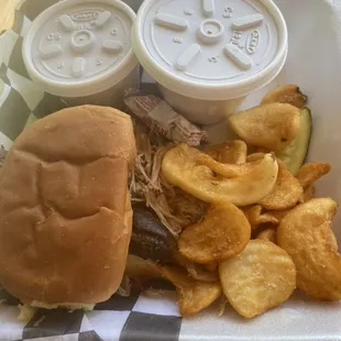 Pulled pork sandwich and fries
