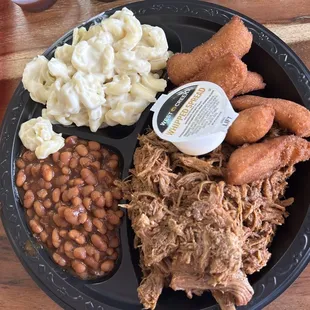 Pork Plate with Macaroni and cheese, baked beans and hush puppies