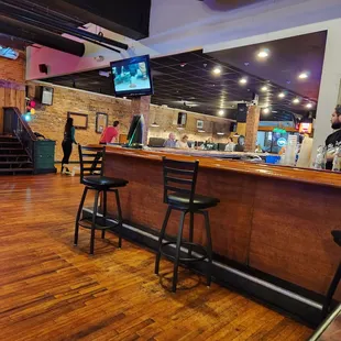 a bar with stools