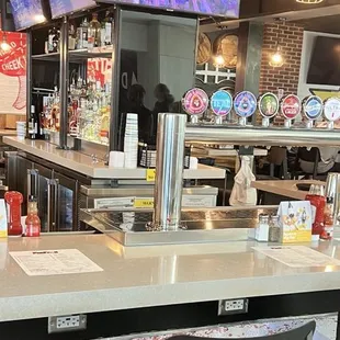 Dust and dingy spider webs in the lighting.