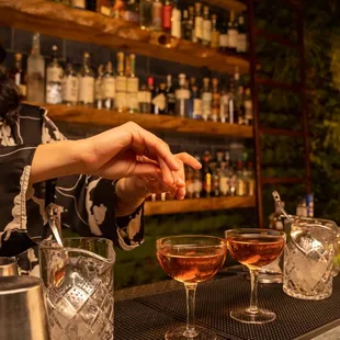 a bartender making a drink