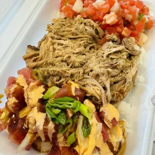 Kalua pork, poke and lomi salmon plate.