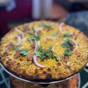 Create Your Pizza with Indian influence.