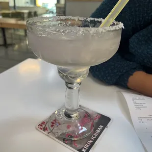 The strawberry margarita is kinda pale.