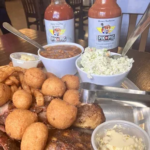 Brisket, bbq chicken, pulled pork,honey bbq sauce, jalapeño butter, hush puppies,French fries,coleslaw,spicy vinegar sauce