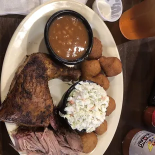 Pulled pork,bbq chicken slaw baked beans hush puppies