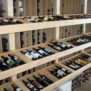 a wine rack full of wine bottles