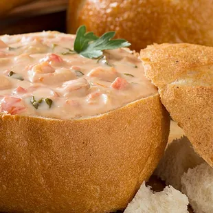 Our Seafood Bisque in a fresh-from-the-oven sourdough bread bowl.