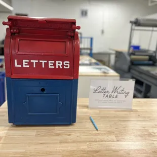 a red and blue letter box