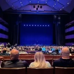 a large auditorium full of people