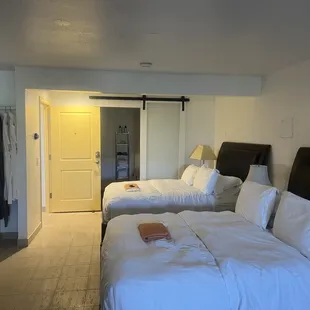 The two queen beds in our room. So comfy!