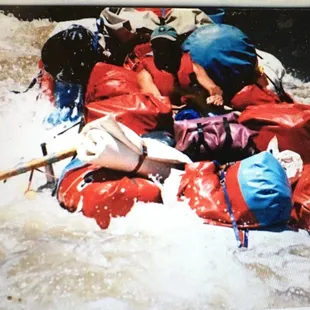 a group of people in a raft