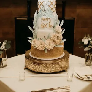 Our wedding cake with custom emblem. Was three flavors