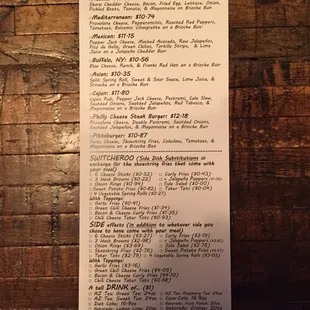 a menu on a wooden table