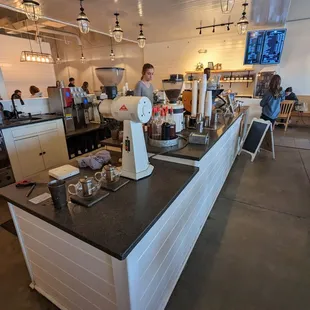 a bari serving a cup of coffee