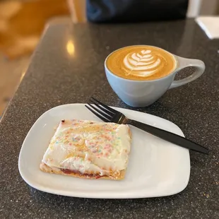 Latte with an extra shot and a strawberry tart. Delish!