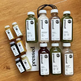 This location is a Pressed™ Post Hub, selling cold-pressed juices, wellness shots, and smoothies
