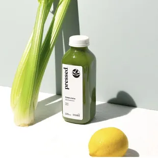 This location is a Pressed™ Post Hub, selling cold-pressed juices, wellness shots, and smoothies