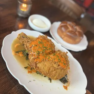 Fried chicken-$33 with greens, cornbread brioche, and butter. Huge! 2 person feast!