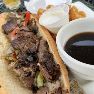 Tri Tip Dip with cheese, onions, peppers, and mushrooms added. The jus on the side is delicious.