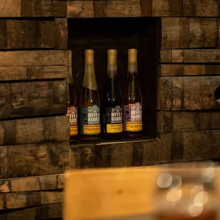 Speakeasy display of Hive &amp; Barrel Mead wines.