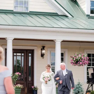 Horse farm wedding father walking the bride to the alter.