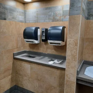 a public restroom with two sinks