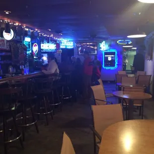 the bar and lounge area at night