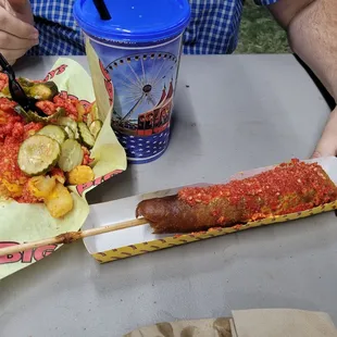 Hot cheetos with cheese fries and hot cheetos corn dog from Biggys BBQ.