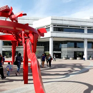 Joel D. Valdez Main Library with sculpture "Sonora" on Jacome Plaza.