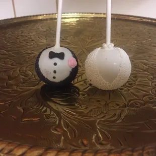Don't mind the little spot on the groom cake pop. Another one of the goodies at my dessert bar rubbed off on it. But how cute are these?!