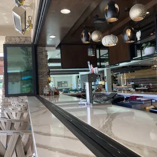 Indoor/outdoor bar by the pool.