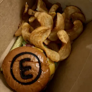 Burger with branded bun. Comes with awesome fries.
