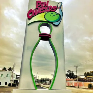 a sign for a bowling tournament