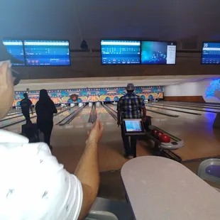 a man playing bowling
