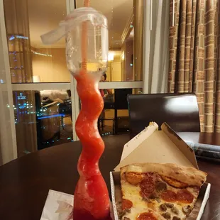 Pepperoni sausage pizza slice.