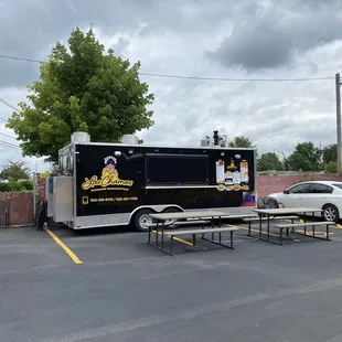 a food truck parked in a parking lot