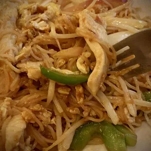 Singapore Rice Noodle (with chicken) has a more earthy flavor, and heat, than the yellow-curry-powder version from Chinese take-outs.