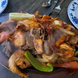 Mixed fajitas, sizzling HOT. #DELICIOUS