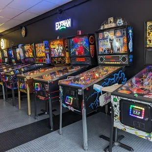 a row of pinball machines